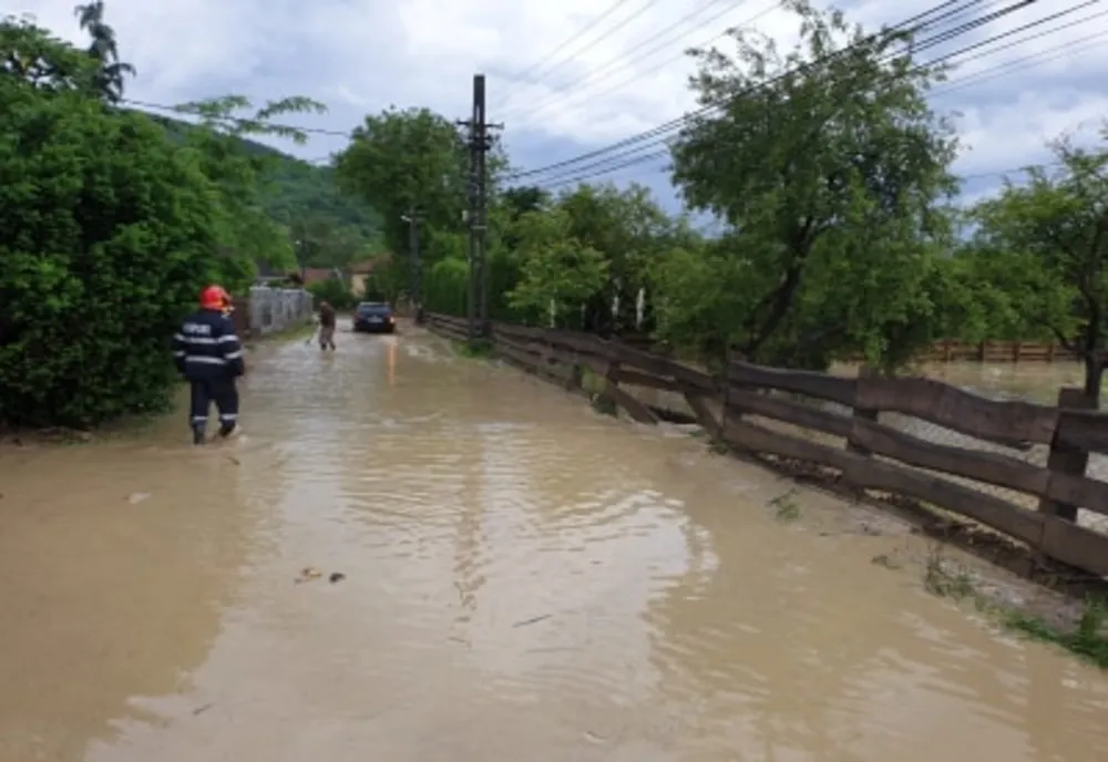 ( FOTO) Străzi și gospodării inundate în Sighetu Marmației