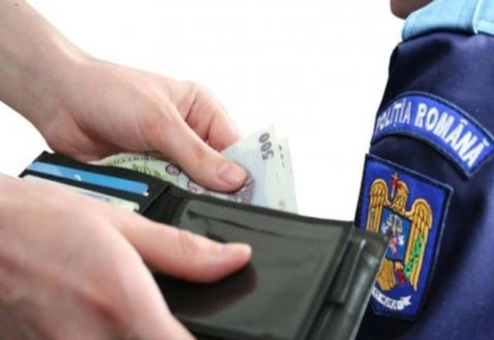 Doi polițiști maramureșeni, condamnați cu suspendare pentru luare de mită! Alți 5 își așteaptă pedepsele