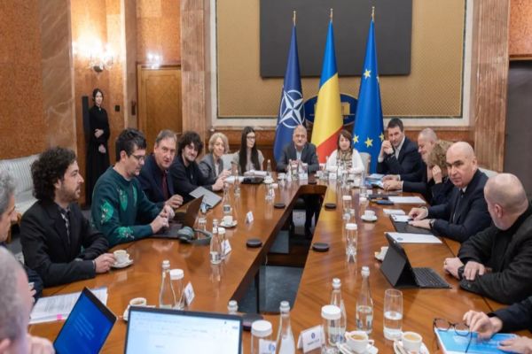 În ziua moțiunii, Bolojan s-a întâlnit cu Tudor Chirilă și Marius Moga. Ce legi se discută în spatele ușilor închise