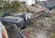 Accident grav în Vadu Izei.Un șofer s-a lovit de un cap de podeț după care a rupt un gard și s-a răsturnat pe acoperișul unei anexe